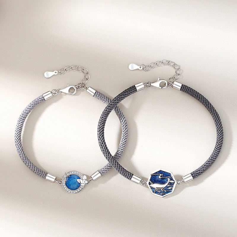 A Pair Of Whale Lovers Bracelets In Sterling Silver