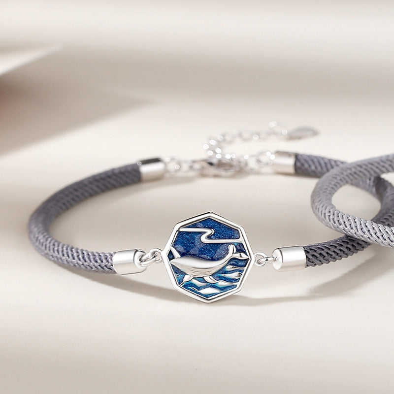 A Pair Of Whale Lovers Bracelets In Sterling Silver